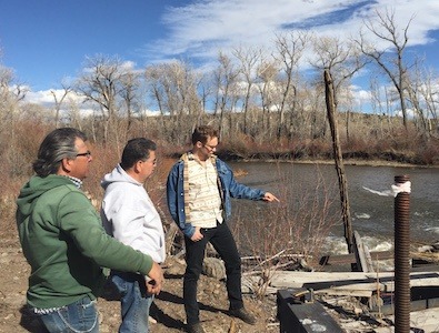 Farmers show CU Boulder law student Gunnar Paulsen where the San Antonio River flows into the El Codo Ditch.