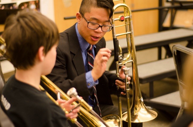 CU Boulder undergraduate hones his teaching skills as part of the Middle School Ensemble Program.