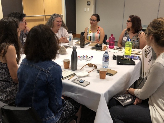 Members of the Outreach and Engagement Professionals Network discuss their work at a June 2018 workshop. (Photo by Jeanne McDonald, CU Boulder)